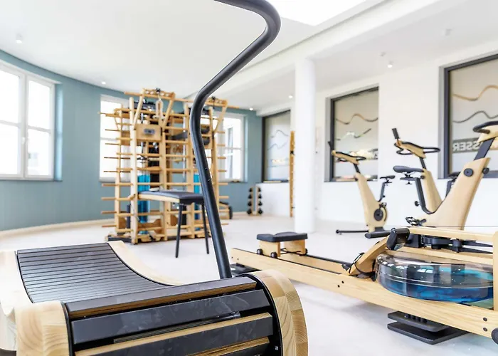 Апартаменты Kleine Strandoase - Mit Suedbalkon, Wellness & Boddenblick *