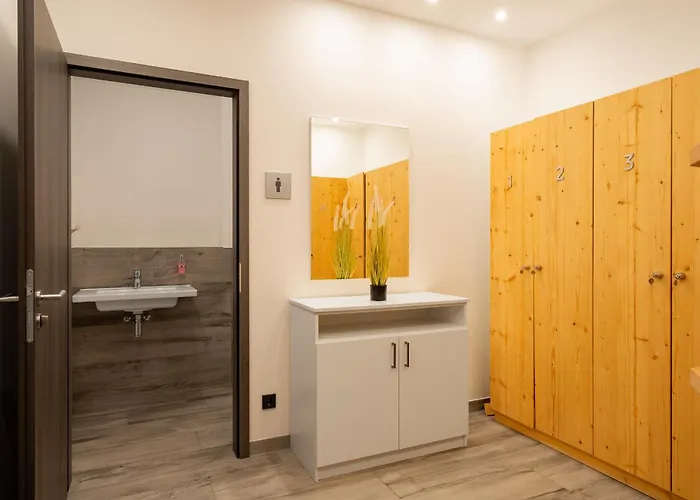 Апартаменты Kleine Strandoase - Mit Suedbalkon, Wellness & Boddenblick